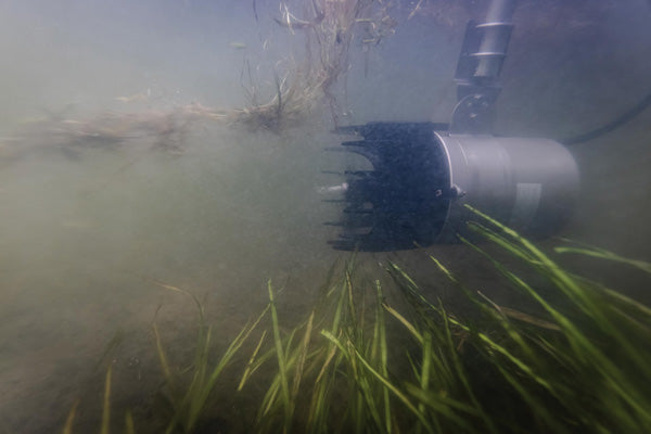 Kasco AquatiClear Water Circulator operating underwater to move water and help clear weeds, algae and debris near the shoreline