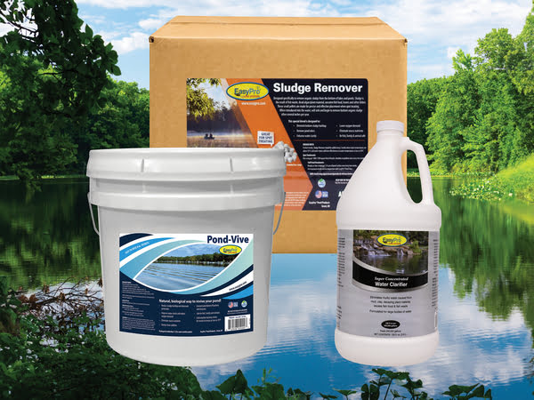 A box of salinity remover and a bucket of water, used for water treatments in ponds and lakes.